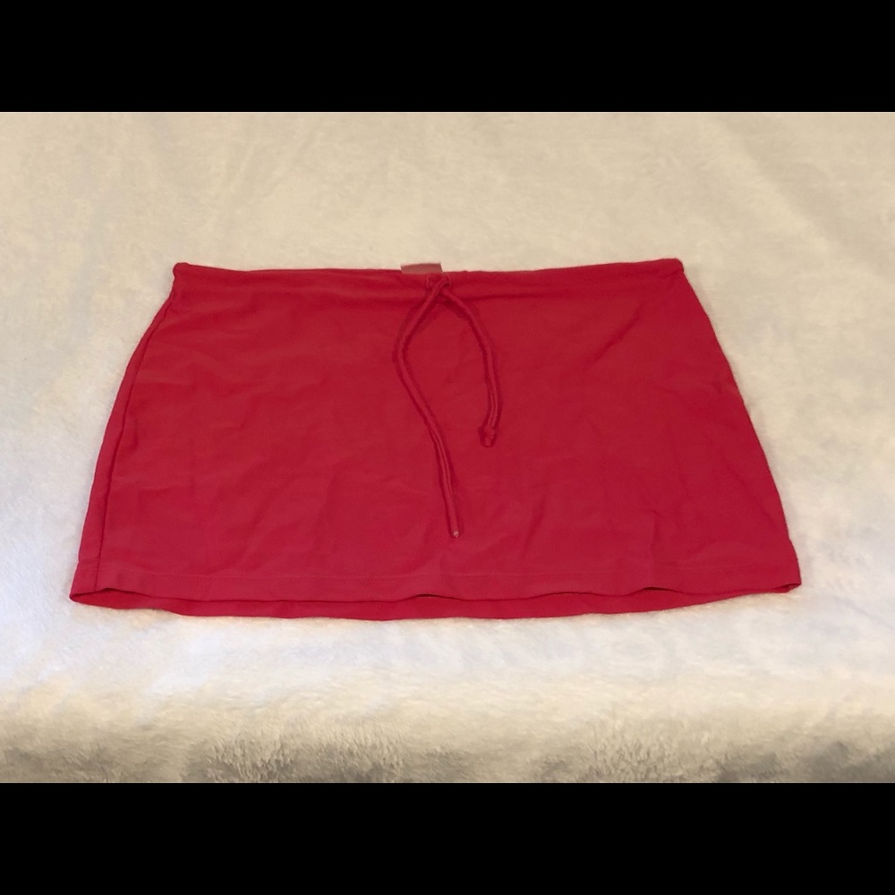 Pink mini skirt bathing suit cover up